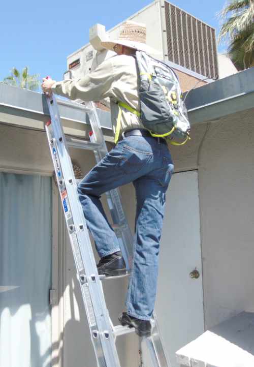 HVACSignal Wireless Thermometers technician climbs ladder